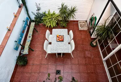 an overhead view of a patio with a table and chairs at Holiday home La casa azul in Barcelona
