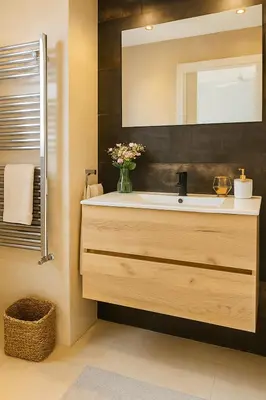 a bathroom with a sink and a mirror at Apartamento Sol Terraza in Montgat