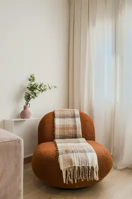 a bedroom with a large white bed with two lamps at Barcelona Aura Apartments in Hospitalet de Llobregat