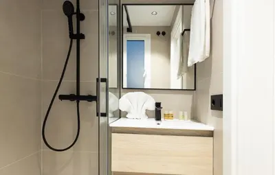 a bathroom with a shower and a sink at Stay U-nique Apartments Balmes II in Barcelona