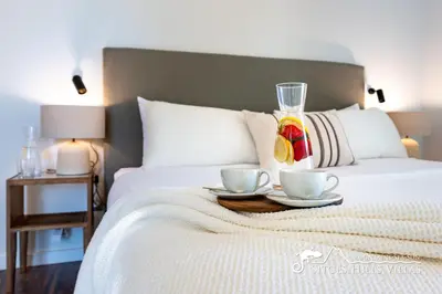 a room with a balcony with a table and chairs at Stunning Villa Angeles with Private Pool and AC close to Sitges in Olivella