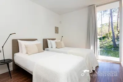 a bathroom with a shower and a toilet and a sink at Stunning Villa Angeles with Private Pool and AC close to Sitges in Olivella