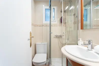 a bathroom with a shower and a toilet and a sink at 3 Bdr Apt In Cornella 5 Mins Form The Metro in Cornellà de Llobregat