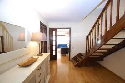 a hallway with a staircase in a house at Sant Guillem in Vilassar de Mar