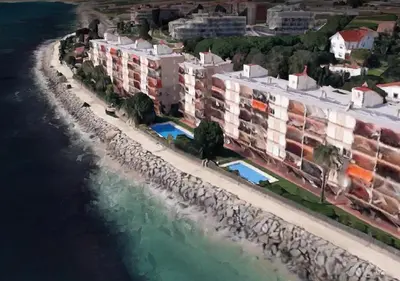 an aerial view of a resort by the water at Apartment La Rosa (Blaumar) in Sant Andreu de Llavaneres