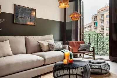 a kitchen with a table and a dining room at Vili - 2 bedrooms and balcony in Sant Antoni in Barcelona