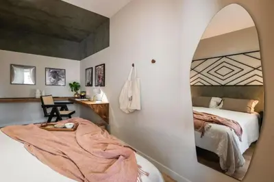 a living room with a couch and a table at Lulua - 2 bedrooms in Eixample Dreta in Barcelona