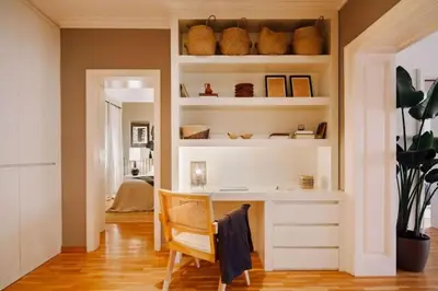 a bedroom with a large bed and two lamps at Yulu - 3 bedrooms and balcony in Eixample Dreta in Barcelona