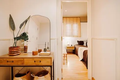 a home office with a desk and a chair at Yulu - 3 bedrooms and balcony in Eixample Dreta in Barcelona
