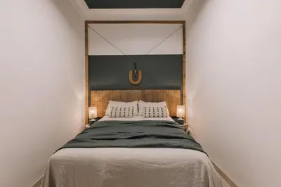 a laundry room with a table and a washing machine at Bambuti - 3 bedrooms and balcony in Passeig Sant Joan in Barcelona