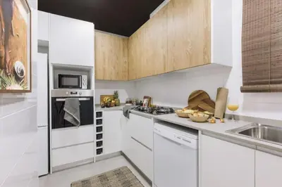 a bedroom with a large bed with a mirror at Bambuti - 3 bedrooms and balcony in Passeig Sant Joan in Barcelona