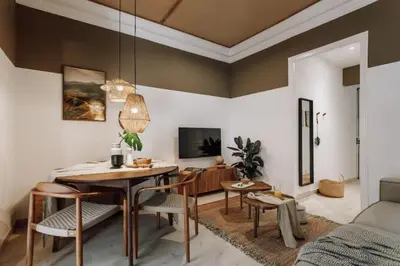 a bedroom with a bed and a large window at Zioba - 3 bedroom and balcony in Gracia in Barcelona