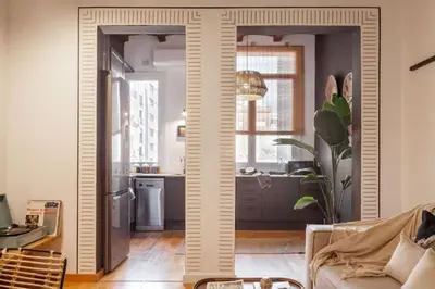 a room with a desk with chairs and a window at Kakwa - 2 bedroom and balcony Eixample Esquerra in Barcelona