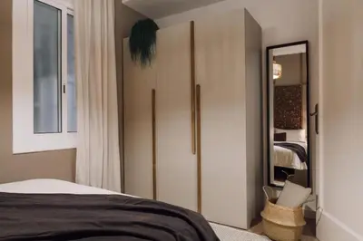 a bathroom with a toilet and a glass shower at Baka - 2 bedroom with terrace in Sant Gervasi in Barcelona