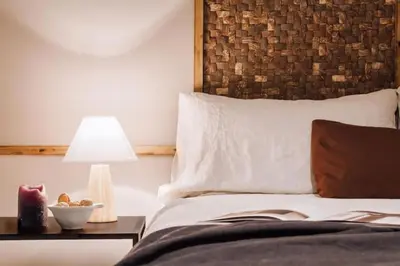 a bedroom with a bed with a tray on it at Baka - 2 bedroom with terrace in Sant Gervasi in Barcelona