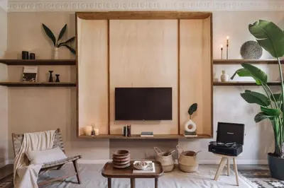 a bedroom with a bed and a desk and a chair at Ulindi - 2 bedroom with balcony in Eixample Esquerra in Barcelona
