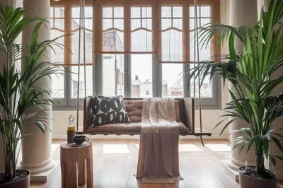 a hallway of a home with white walls at Sanga - 2 bedroom in Eixample Esquerra in Barcelona