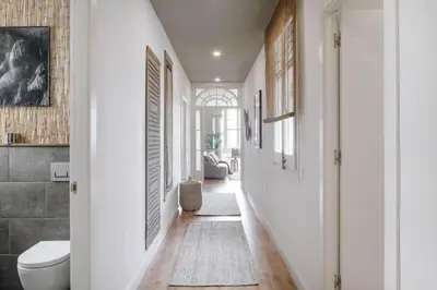 a living room with a couch and a flat screen tv at Sanga - 2 bedroom in Eixample Esquerra in Barcelona