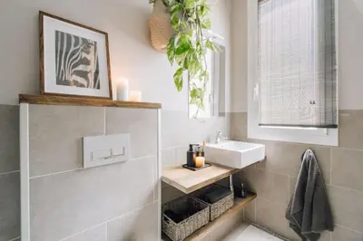 a bathroom with a sink and a mirror at Salonga - 1 bedroom and balcony in Eixample Esquerra in Barcelona