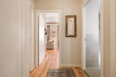 a living room with a couch and a table at Salonga - 1 bedroom and balcony in Eixample Esquerra in Barcelona