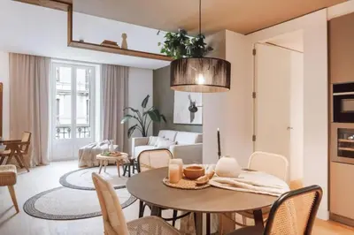 a bedroom with a bed and a large window at Kele - 1 bedroom and swimming pool in Passeig de Gracia in Barcelona