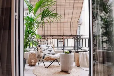 a living room with a couch and a table at Zongo - 2 bedroom in Eixample Dreta in Barcelona