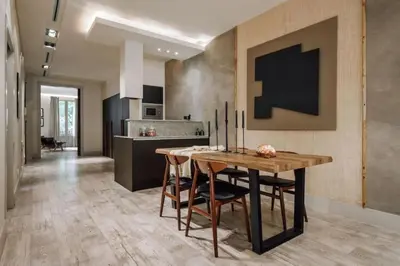 a kitchen with a stove and a counter top at Matadi - one bedroom and terrace in Eixample Esquerra in Barcelona
