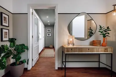 a bathroom with a sink and a mirror at Kamina - 2 bedroom in Passeig de Gracia in Barcelona