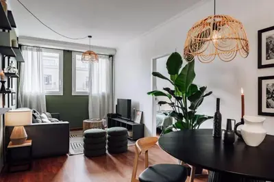 a living room with a table and a couch at Kamina - 2 bedroom in Passeig de Gracia in Barcelona