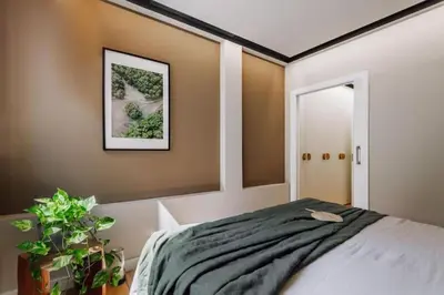 a bathroom with a sink and a mirror at Lega - 2 bedroom in Passeig de Gracia in Barcelona