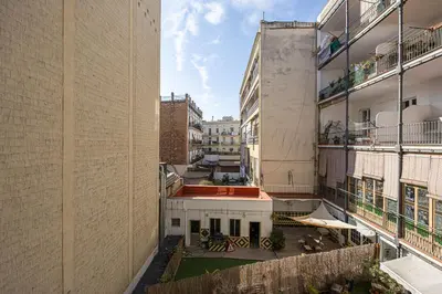 an aerial view of a courtyard between two buildings at Lovely&cozy In Born in Barcelona