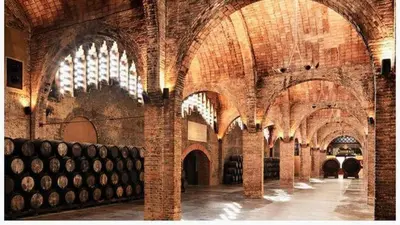 a large brick building with barrels in it at Habitación y Baño Privado, Tranquilidad y Naturaleza. in Barcelona