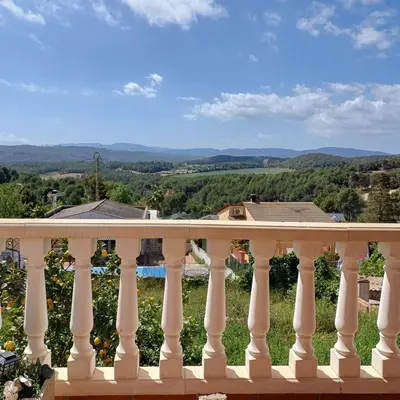 a view from the balcony of a house at Habitación y Baño Privado, Tranquilidad y Naturaleza. in Barcelona