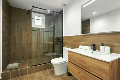 a bathroom with a toilet and a sink and a shower at Comfortable apartment next to Apolo theater in Barcelona