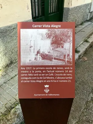 a sign on a parking meter in front of a building at Vista Alegre Rest House for 7 Persons in Vallromanas