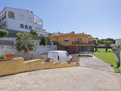 a white van parked in front of a house at Villa Marítima in Pineda de Mar in Pineda de Mar