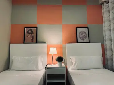 two beds sitting next to each other in a bedroom at Sweet BCN Provenza in Barcelona