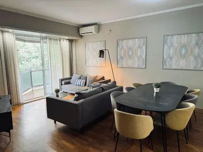 a living room with a couch and a table at Sweet BCN Provenza in Barcelona