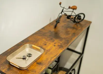 a table with a sink and a bike on it at Home365 · Barberá del Vallés · Barcelona in Barbera del Valles