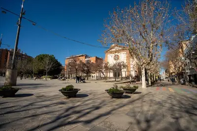 a city street with a building and some trees at Home365 · Barberá del Vallés · Barcelona in Barbera del Valles