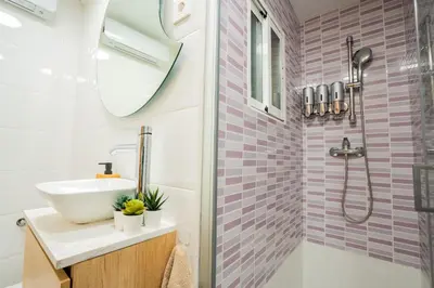 a bathroom with a sink and a shower at Home365 · Barberá del Vallés · Barcelona in Barbera del Valles