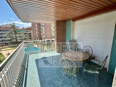 a patio with a table and chairs on a balcony at BV-SV-002-Mediterrani in Sant Andreu de Llavaneres