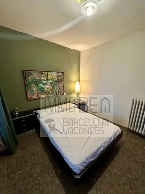 a bedroom with a large bed in a room at BV-SV-002-Mediterrani in Sant Andreu de Llavaneres