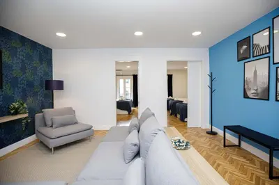 a living room with a couch and a chair at Stay U-nique Apartments Rambla Catalunya VI in Barcelona