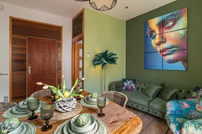 a living room with a table and a couch at OASIS BEACH-CITY apartment in Montgat