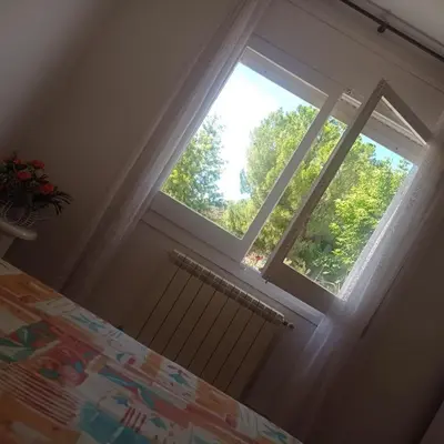 a window in a room with a radiator in front of it at Ca La Montserrat - Wine Rural House in San Martín Sarroca