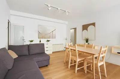 a living room with a table and a couch at 