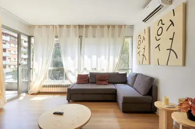 a living room with a couch and a table at 