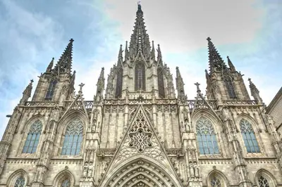 a large cathedral with many towers on a cloudy sky at Penthouse 100m from Sea with Terrace, Near BCN in Mataró