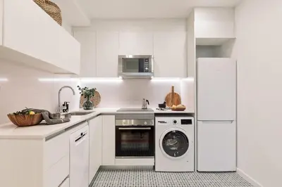 a living room with a couch and a table at Pompei - 2 bedrooms, balcony and terrace in Ciutat Vella in Barcelona